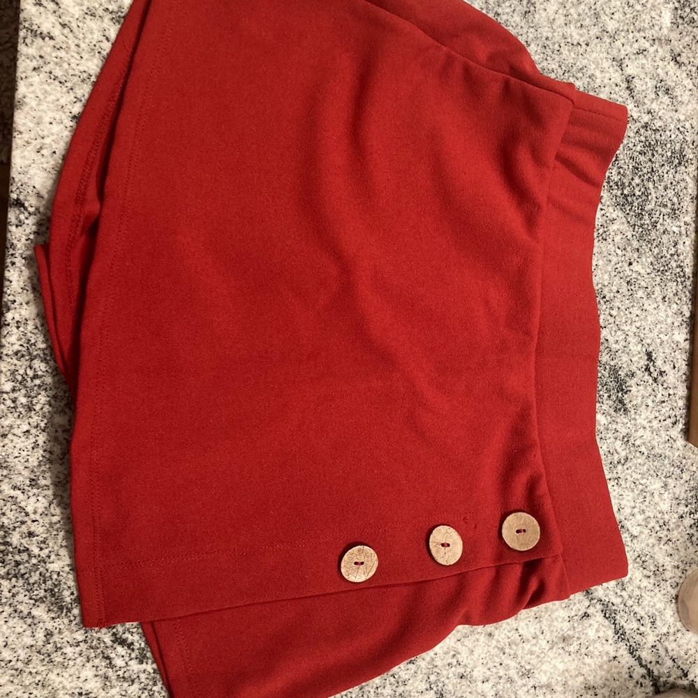 Red button detail skirt with shorts